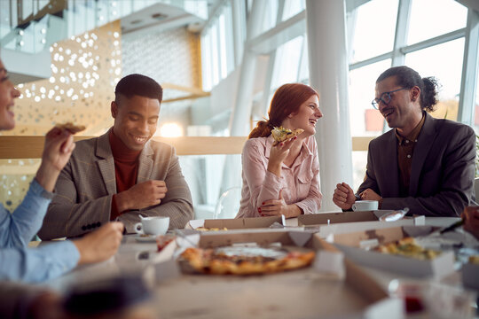 Young group of people in restaurant lunch and talks