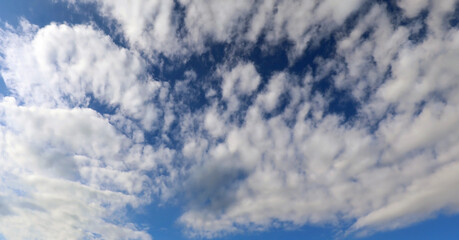 wide blue sky with beautiful white clouds ideal as natural backdrop
