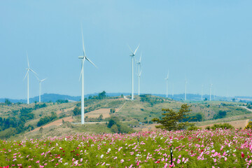 Thailand wind turbine landmark on the sky background in rural area.