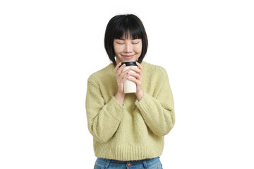 Young asian woman smiling smelling a coffee cup, isolated.