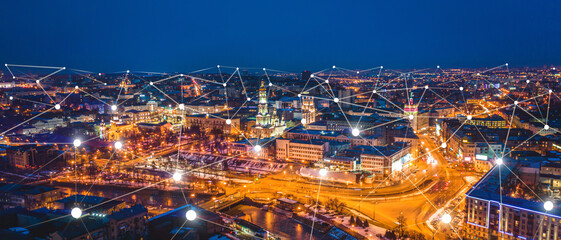 Fototapeta na wymiar Concept of connection and next generation network 5G on the big night city background. Design of modern mobile and communication technologies. People networking