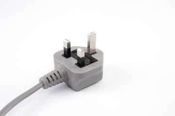 UK standard AC line plug isolated on the white background.