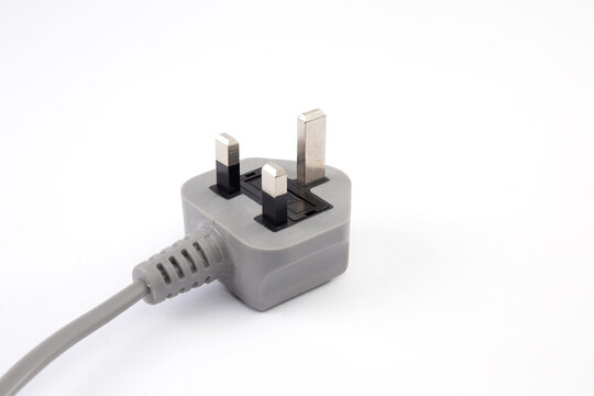 UK standard AC line plug isolated on the white background.