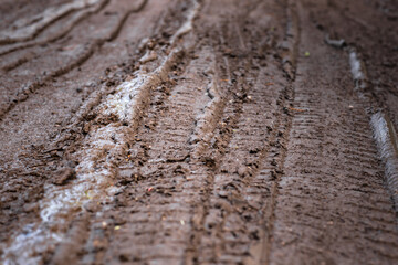 Mud on the road, dirt road in spring, rural dirt road after rains in spring,