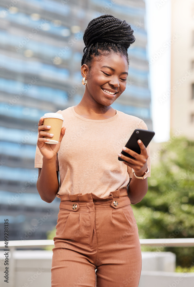 Poster Im ready to get this day started. Shot of a young businesswoman standing on the balcony outside and using her cellphone while holding a cup of coffee.