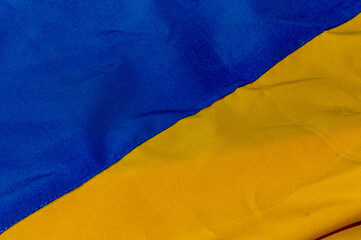 Ukraine National flag. Fabric textured flag of Ukraine. Blue and yellow colors