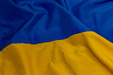 Ukraine National flag. Fabric textured flag of Ukraine. Blue and yellow colors