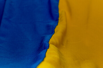 Ukraine National flag. Fabric textured flag of Ukraine. Blue and yellow colors