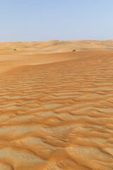 Dunes and colored sands of the Rub al-Khali desert