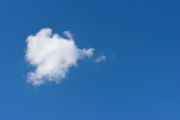 lovely fluffy white clouds in the sky above Sydney NSW Australia at sunset