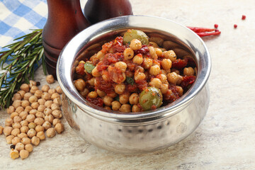 Chickpea beans with dry tomato and olives