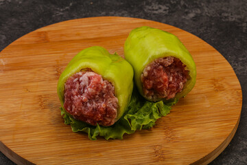 Raw stuffed pepper for cooking