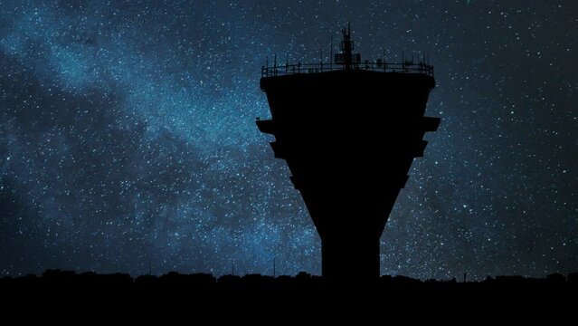 Traffic Control Tower in International Airport, Time Lapse with Stars and Milky Way in Background