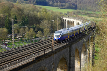 A train is speeding over an old railway viaduct. It is a 482 metres long and up to 35 metres high...