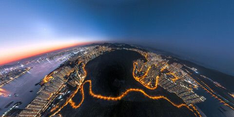 Panorama aerial view of Hong Kong crowded building at magic hour