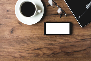 office desk pen, glasess, smartphone and notepad.