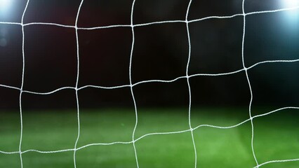 Super slow motion of soccer goal net moving. Filmed on high speed cinema camera, 1000fps.