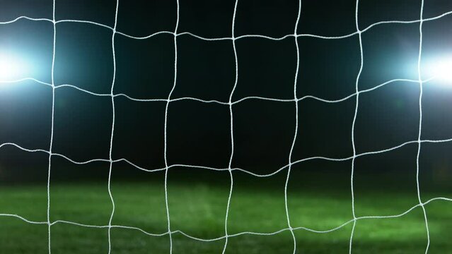 Super slow motion of soccer goal net moving. Filmed on high speed cinema camera, 1000fps.