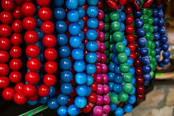 Wooden red beads on the market