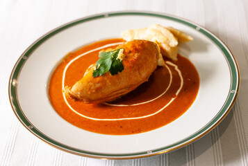 Hungarian Chicken Paprikash with Spaetzle, a Chicken Breast with Paprika Sauce and Small Dumplings