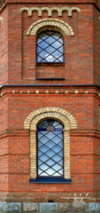 Obraz premium General view and architectural details of a close-up of the Catholic church of St. Michael the Archangel built at the turn of the 19th and 20th centuries in Jabłonka Koscielna in Podlasie, Poland.