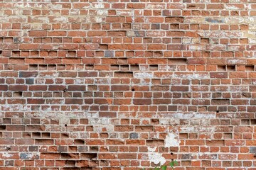 Shabby wall of old red brick. Reference material, reference information.