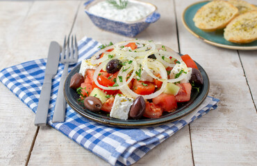 Greek salad with tzatziki, olives and feta cream. Traditional greek salad, meze,  with olive oil.
