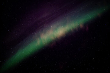 Fototapeta na wymiar Northern Lights (Aurora Borealis) in Norway during wintertime
