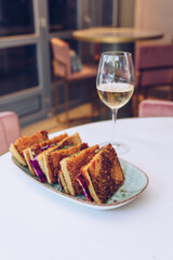 Lunch with katsu sando and a glass of wine.