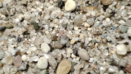 Macro gravel texture. Closeup pebble backgrounds