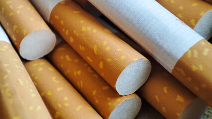 Filter tipped cigarettes. Nicotine addiction, Unhealthy habit probides cancer concept