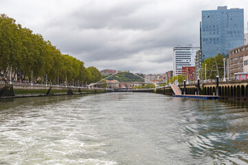 A view of the city of Bilbao from a boat in the river