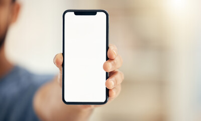 What do you think of this. Shot of an unrecognizable businessman using a phone in an office at work.