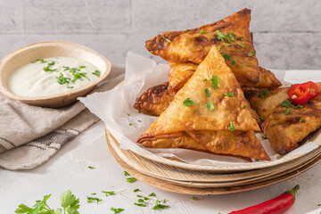 Indian samosas - fried or baked pastry with savoury filling, popular Indian snacks, served with...