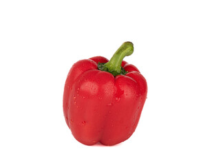 Sweet red pepper with water drops over white background.