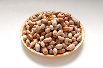 Peanut on wood dish. food background of peanuts.Delicious snacks.