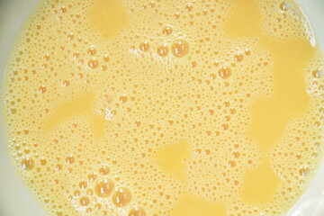 raw egg and yolk beating prepare to cooking in bowl - obrazy, fototapety, plakaty