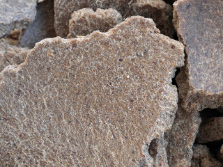 Groundnut or peanut (Arachis hypogaea) cake, by-product after extraction of oil. Cattle feed and an organic fertilizer for vegetables.    