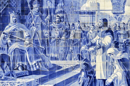 azulejos panel showing the knight Egas Moniz and Alfonso VII of Le&oacute;n in Toledo in the Sao Bento railway station, Oporto, Portugal