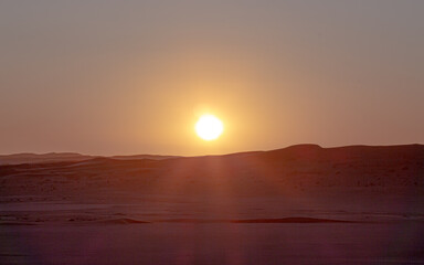 sand dunes in a sunset