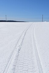 A snowmobile track in a field, Sainte-Apolline, Qu&eacute;bec, Canada