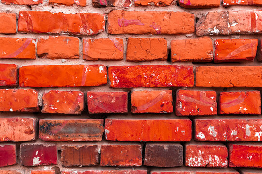 Old and grunge red brick wall texture close-up and high detailed background photo