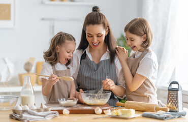 family are preparing bakery together