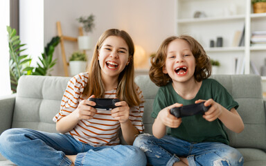 Obraz premium Children playing video games