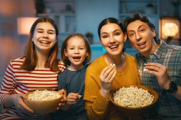 Mother, father and daughters spending time together.