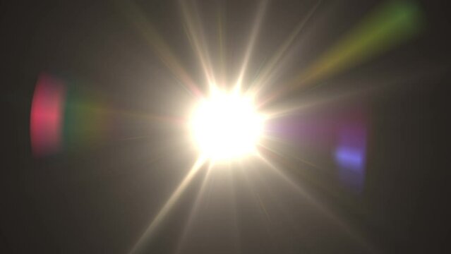 The appearance of light, the sun, dawn. Smooth appearance of light on a black background. Light in 4k resolution.