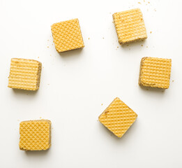 Cube wafer with chocolate cream on isolated white background