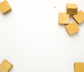 Cube wafer with chocolate cream on isolated white background