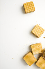 Cube wafer with chocolate cream on isolated white background