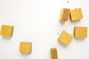 Cube wafer with chocolate cream on isolated white background